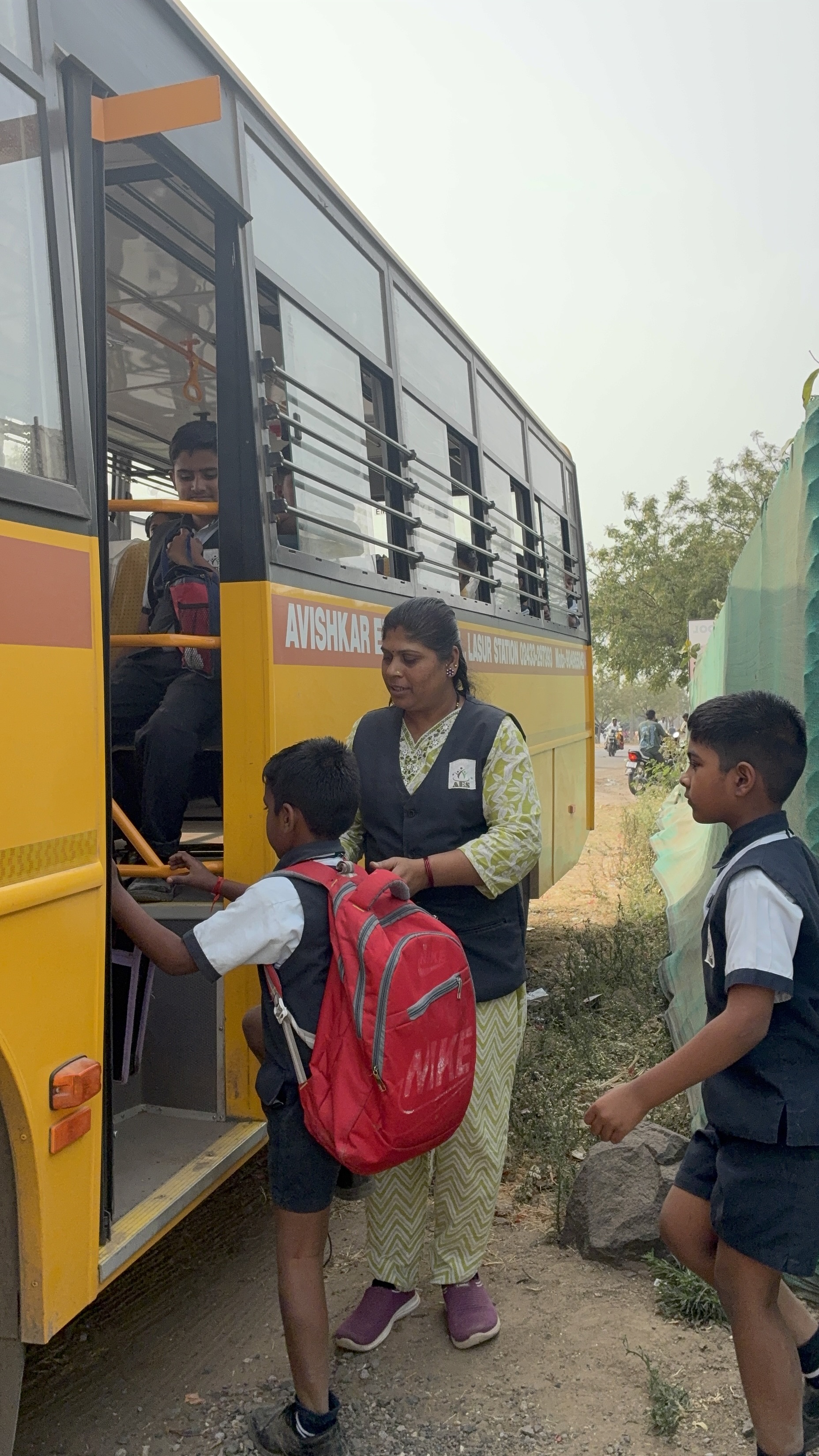 Students safely boarding the school bus